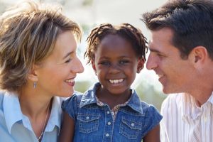 couple-and-adopted-daughter